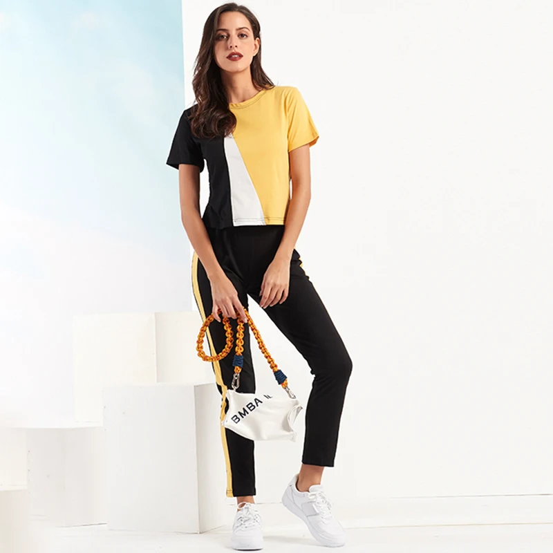 Nova Verão casual Conjunto de Mulheres de Duas peças de Ternos de Manga Curta manta de Retalhos Amarelo T-shirt, Calças Pretas Executar Sportwear de Treino